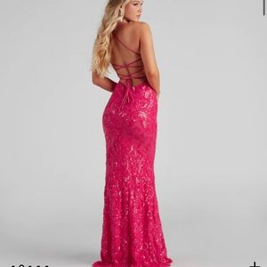 A pink dress that is light weight and great material